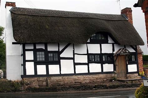 tudor roof styles|tudor house with thatched roof.